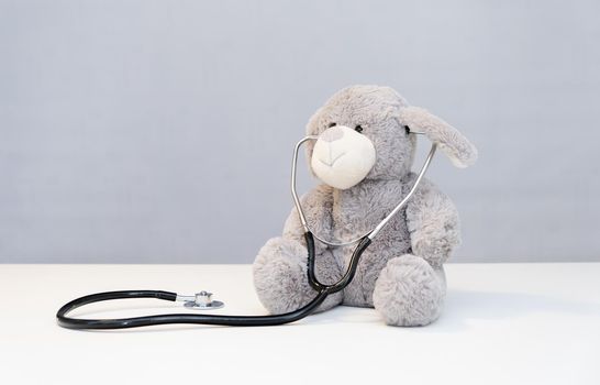 Teddy Bear with stethoscope Health Care teddy bear on background and stethoscope