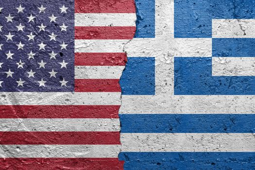 United States of America and Greece - Cracked concrete wall painted with a USA flag on the left and a Greek flag on the right stock photo