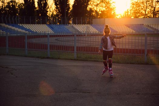 Girl riding roller skates in the park