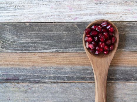 Pomegranate Seeds in Spoon