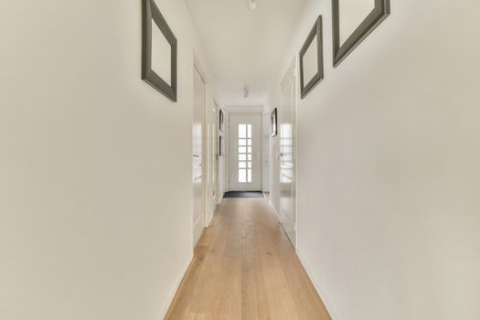 Narrow hallway with classic painting