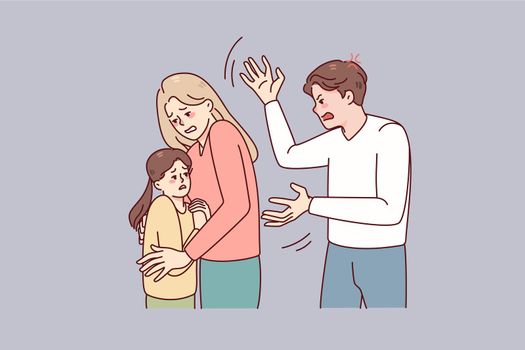 Woman protect child from aggressive husband
