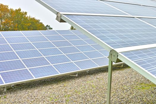 Solar power installation in Denmark. Photovoltaic cell panels as renewable and alternative energy source. Generating electricity in power supply station, alternative energy from nature