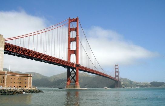 Ferry Boat passes under Golden Gate Bridge
