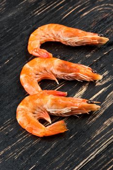 Three boiled shrimp