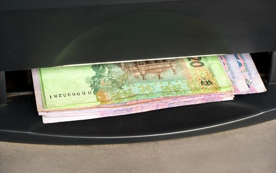 Ukrainian money from an ATM
