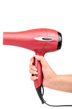 Pink hair dryer in hand