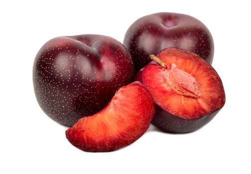 Red plum with slice