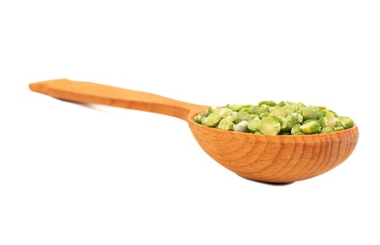 Dry green peas in spoon