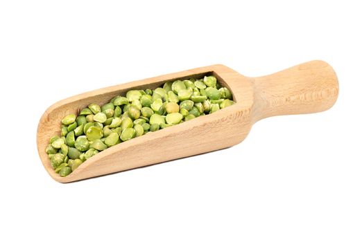 Dry green peas in scoop