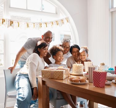 Make the most of it. Shot of a happy family celebrating a birthday at home.