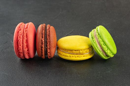 Four multicolored macaroons