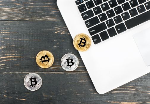 Coins bitcoin with laptop