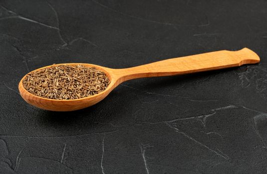 Dry cumin in spoon