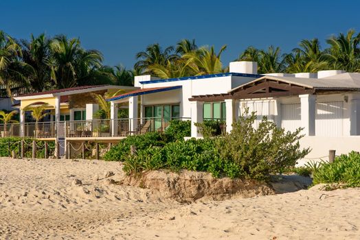 Luxury beach houses along the sand dunes