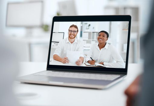 Staying safe, having virtual meetings. a group of businesspeople in a virtual meeting together at work.
