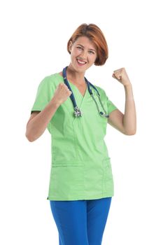 Nurse isolated on white. Female medical professional doctor standing holding fists expressing joy
