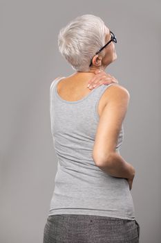 Neck and shoulder pain, senior woman with  body and muscle problems