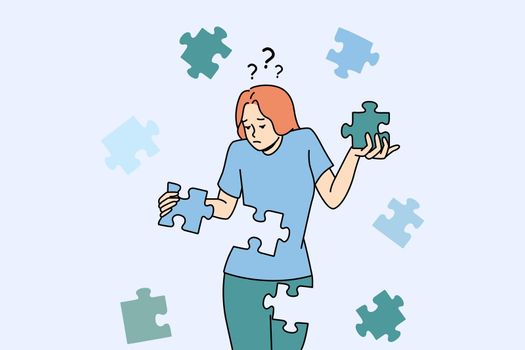 Confused woman connect puzzles rebuild personality