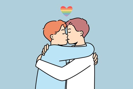 Gay couple hugging and kissing