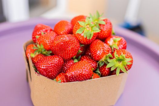Fresh ripe delicious strawberries in bowl - healthy food and vegetarian