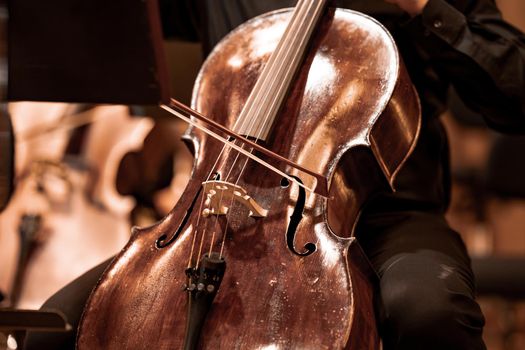 cello on the stage of the Philharmonic during a concert