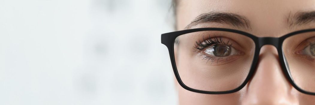 Woman face, female wear glasses for better vision with black frame