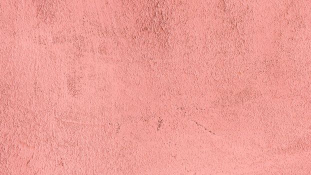 Abstract background of dark pink plaster.