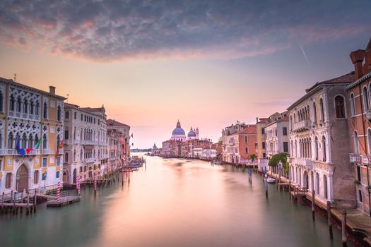 Grand Canal of Venice with blurred movement at sunrise, Italy