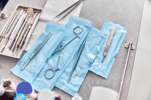 Dental professional equipment on a table of modern clinic