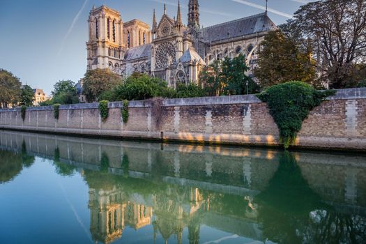 Notre Dame Cathedral and Seine river reflection, Paris, France