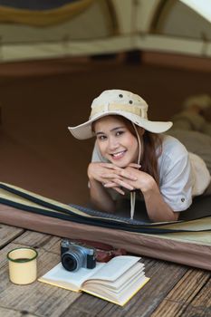 Asian woman journey and camping in Thailand. Travel outdoor activity lifestyle.