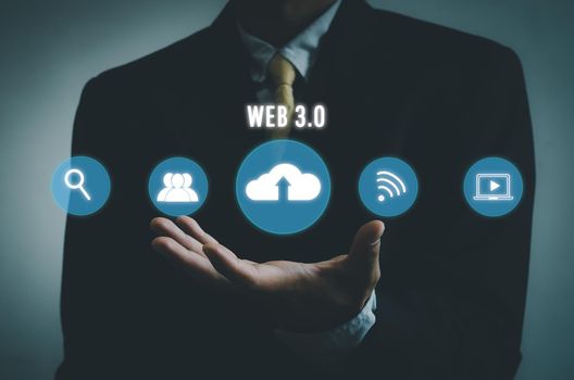 Businessman selecting web 3.0 on virtual screen.
