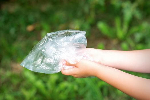 Plastic bag in little hands