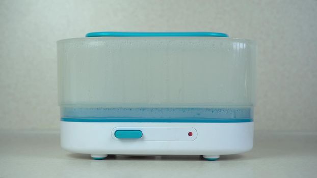 Steam sterilizer for baby dishes cleansing germs and bacteria.
