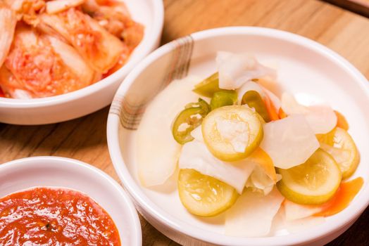 Korean pickle or Pickled radish vegetables and seasoning on bowl