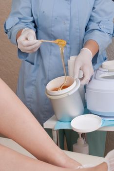 sugaring wax at a professional cosmetologist