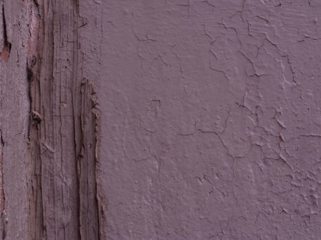 Abstract background of old damaged plaster with undertones.