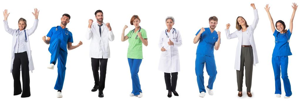 Happy doctors and nurses with arms raised