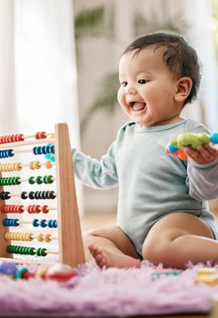 Learning is fun. an adorable baby playing with toys at home.