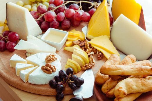 cheese board with grape