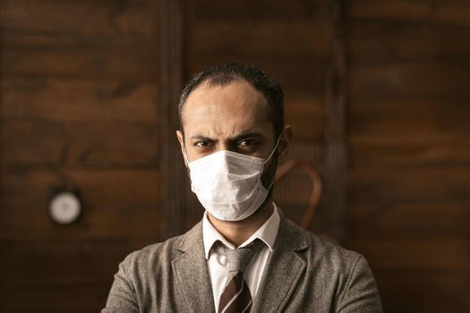 Business man In Protective Mask Is in isolation