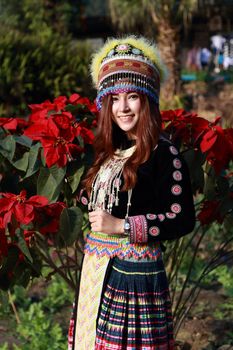Traditionally dressed Mhong hill tribe woman in the garden