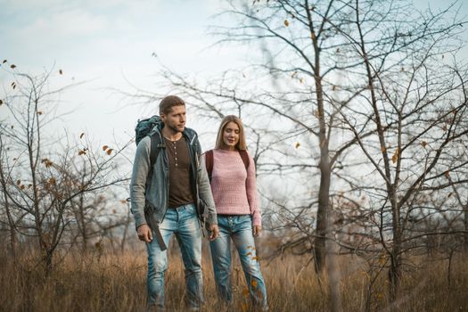 Young Man And Woman hiking In Nature together