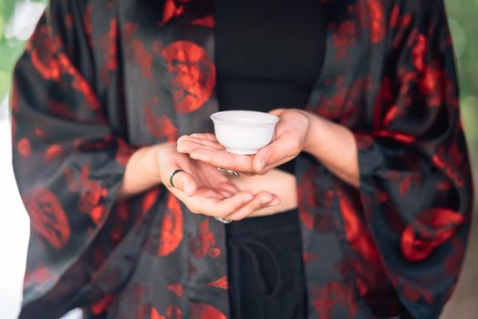 Tea ceremony is performed by tea master in kimono