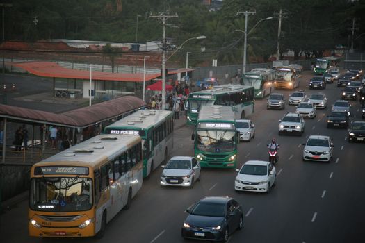 salvador, bahia, brazil - july 19, 2022: passengers waiting for a public transport bus at a stop in the city of Salvador