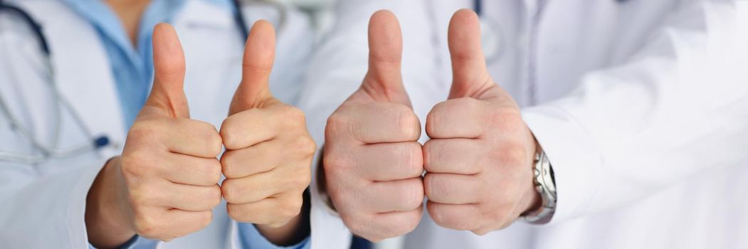 Doctors hands show ok or confirm sign with thumb up