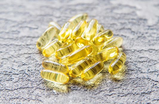 Omega-3 fish oil capsules. Selective focus.medical food