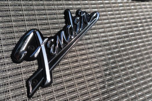 Close-up of Fender logotype on guitar amplifier