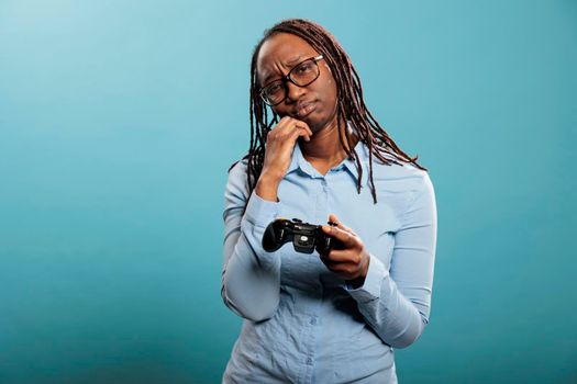 African american woman got upset because of lost online competitive videogame match.